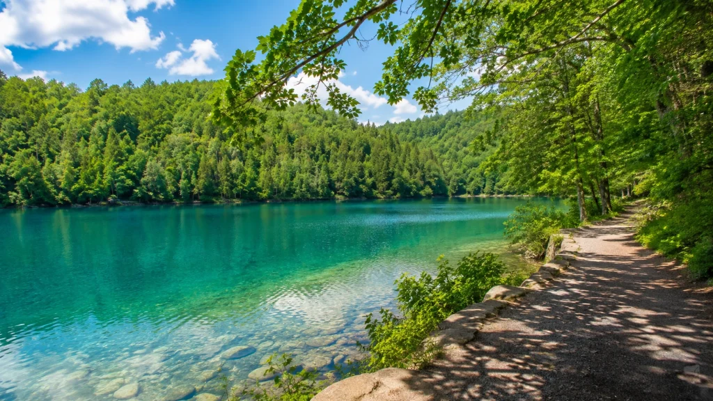 Green Lakes State Park blue-green lake surrounded by forest