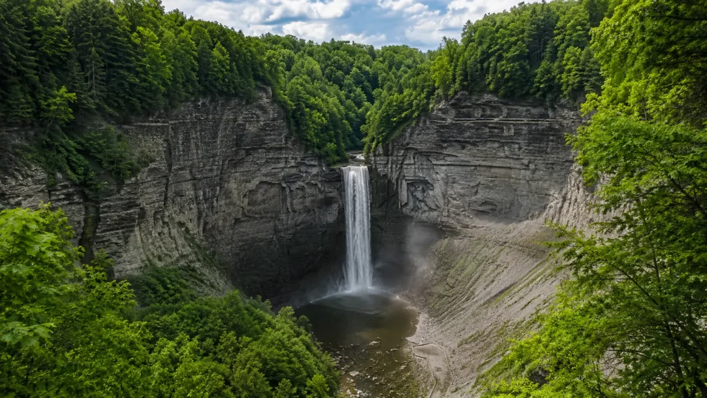 Taughannock Falls State Park waterfall surrounded by a rocky gorge